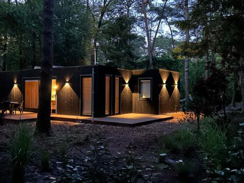 Boshuisje in Norg met panorama sauna