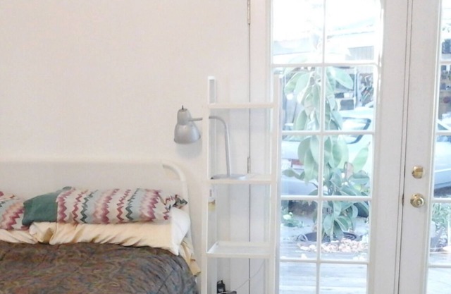 Bright room w/private bath, french doors, desk, TV, Wifi.