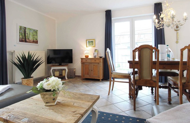 Bright vacation apartment in Kühlungsborn with balcony, beach chair and bicycles