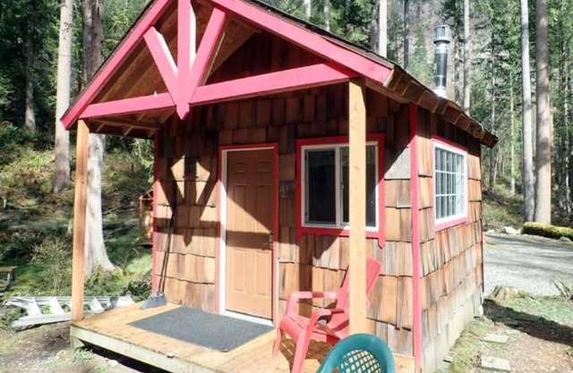 Cabin and adjacent tent site