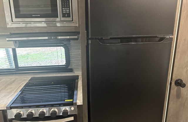 Camper getaway close to Grenada lake fishing, hunting, and more