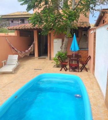 Casa com piscina e churrasqueira em Iguaba grande