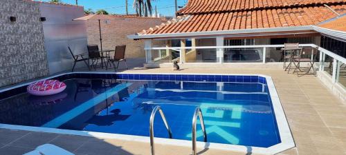 Casa com piscina e Wi Fi em Mongagua SP