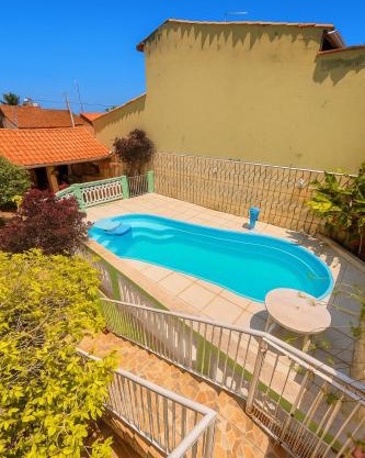 Casa com piscina na praia das palmeiras