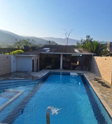 Casa em Bertioga com piscina aquecida