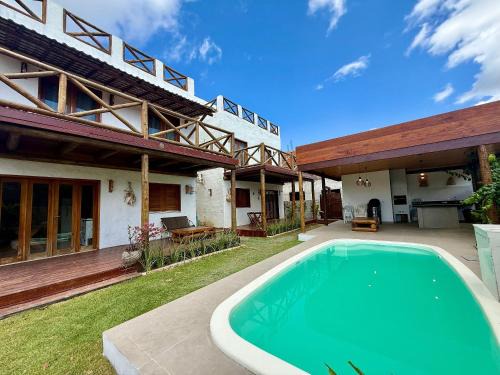 casa perfeita a 150m da praia com 6 suítes