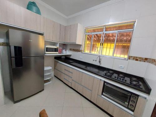 Casa Praia Grande Solemar - 3 min da praia