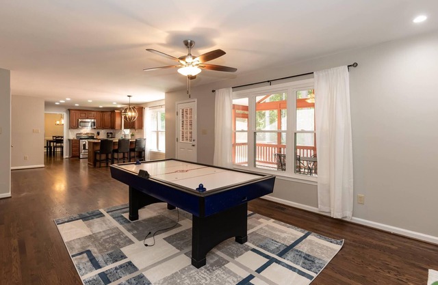 Centrally located by Cary & Holly Springs with a private serene wooded backyard!