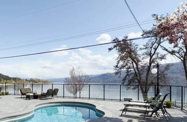 Centrally- located lakeside home on shore of beautiful Okanagan Lake
