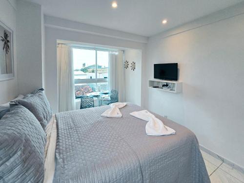 CG101- Flat Rooftop com piscina infinita e garagem- By Oasis Ferias