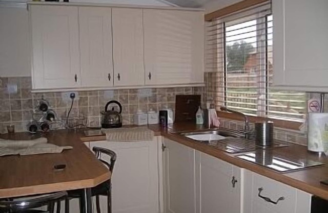 Chalet on small peaceful site with shared heated outdoor pool.