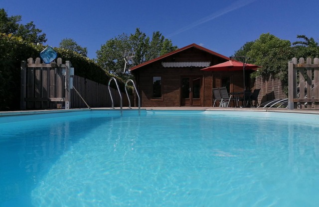 Chalet with private pool overlooking meadow and woodland