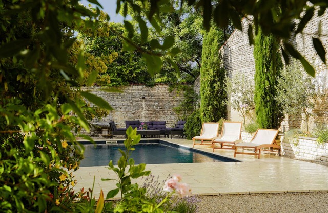 Character house with a pool in the middle of a historic village