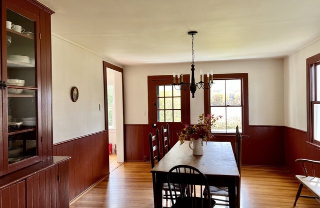 Charming 1800s home with fenced in yard and bucolic farm views !