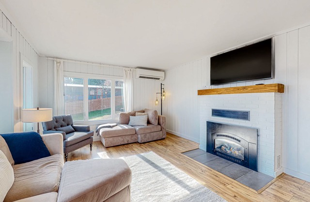 Charming 1940s abode with hot tub, grill, fireplace, & game room - beach access