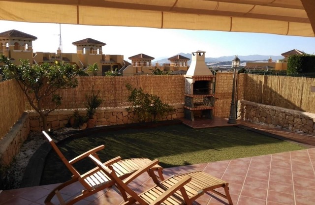 Charming and spacious ground floor apartment with own gardens and shared pool