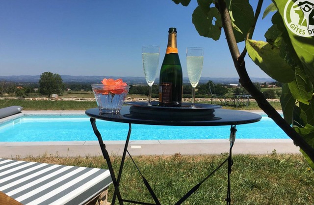 Charming Farm Cottage with Pool, Fireplace, and Modern Amenities in Saint-André-d'Apchon
