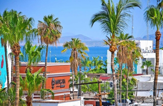 Charming Garden Retreat Just Steps to Malecon