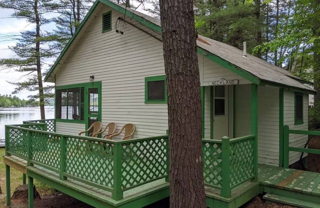 Charming Getaway with Screened Porch, Deck, and Scenic Lake Views