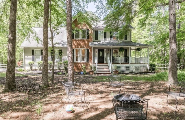 Charming home with above ground pool.