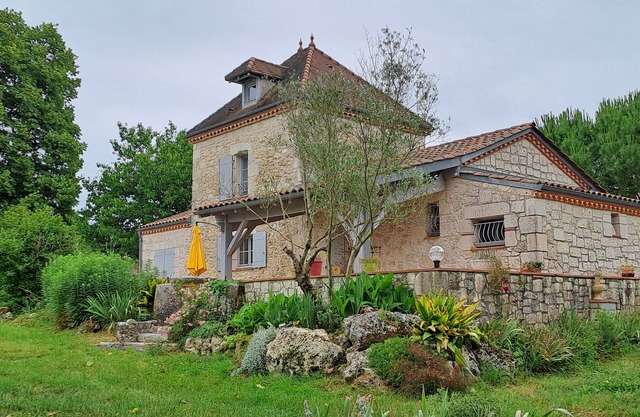 Charming house with dovecote, swimming pool and garden.