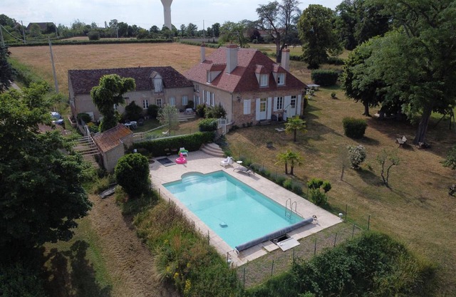 Charming House with Shared Pool, Views of Moulins, and Private Terrace