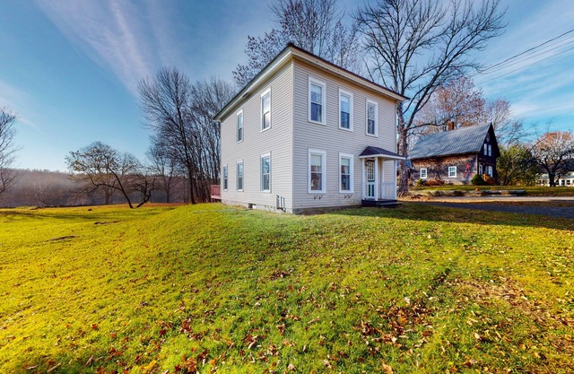 Charming, lakefront dog-friendly home with a firepit, dock, & fast WiFi