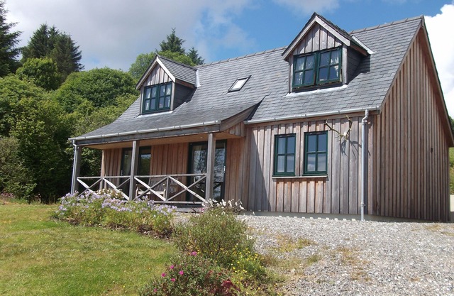 Charming property overlooking beach at Knock Bay and beyond to Knoydart
