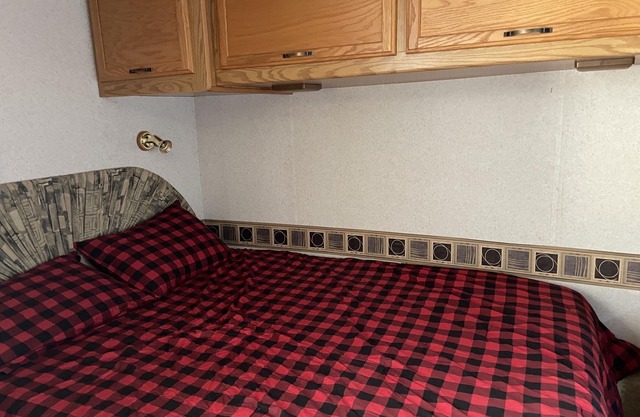Class A motor home on large lot