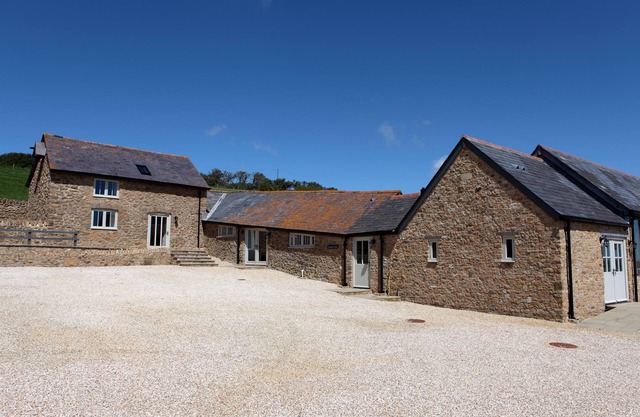 Clayhanger Lodge is a spacious, converted detached barn