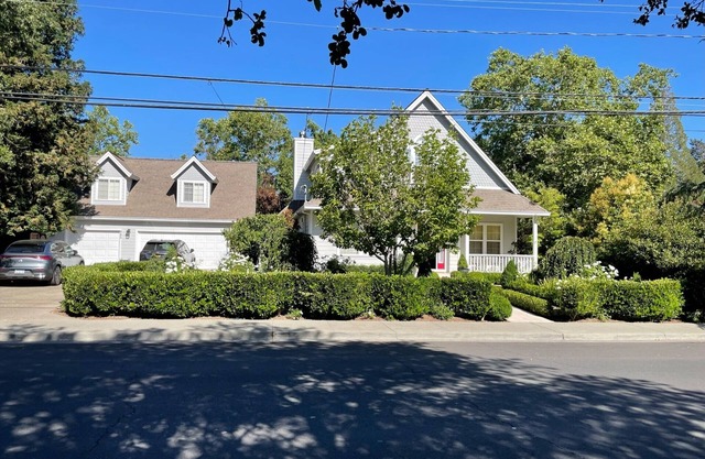 Close to town, 2-car garage, landscaped rear patio with spa, outdoor kitchen.