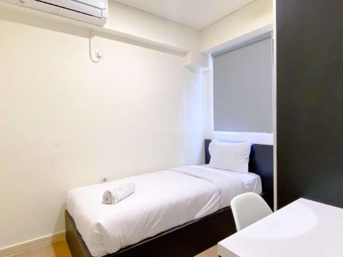 Comfort 2BR with Work Space at Meikarta Apartment By Travelio