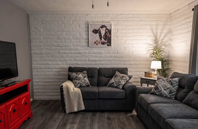 Completely remodeled brick farmhouse themed home