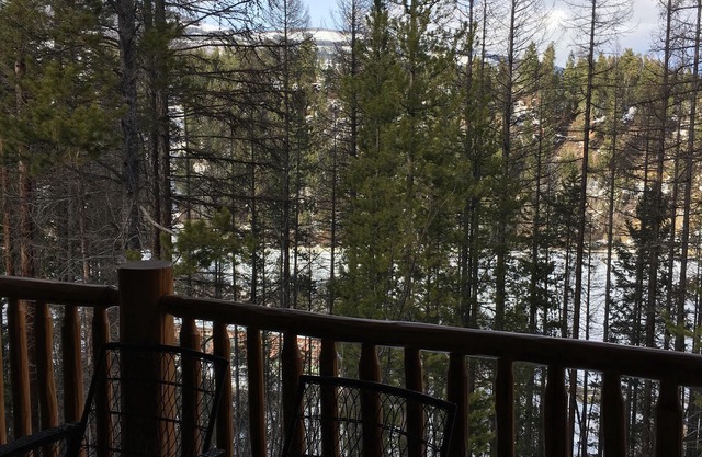 Condo with a mountain view from private hot tub at the base of the ski hill