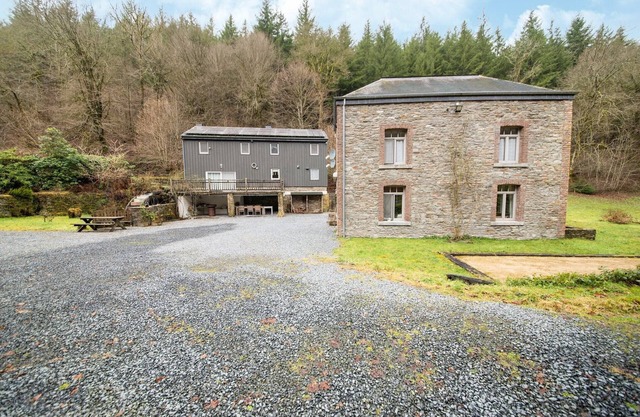 Cottage by Semois River in Ardennes Forest