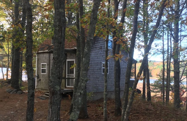 Cottage featuring a Screened Porch overlooking the Water