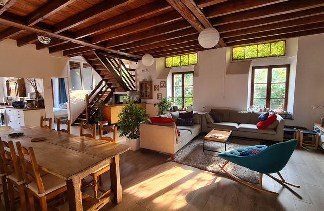 Countryside house with river at the end of the garden