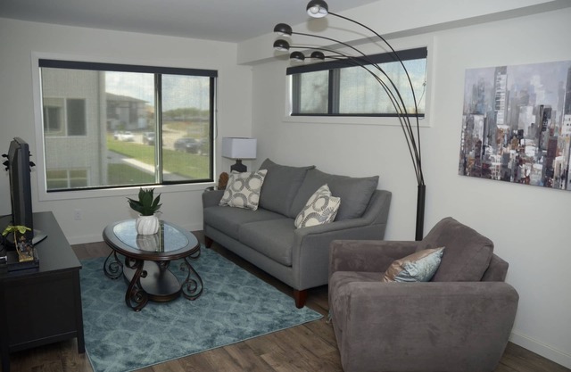 Cozy 2 story condo short drive to downtown, and Osborne strip!