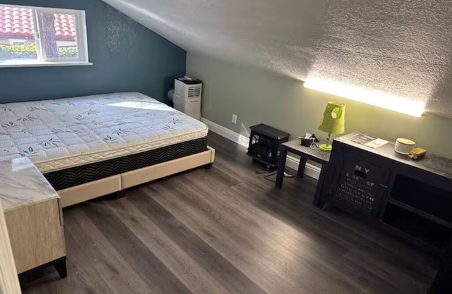 Cozy 205 room with kitchen & laundry—peaceful, comfy, and budget-friendly stay