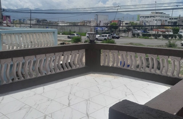 Cozy 4-bedroom apartment in enchanting Portmore with WiFi, AC