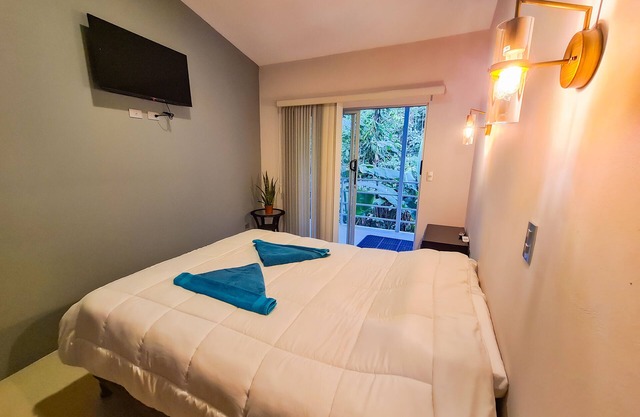 Cozy and Modern Room Perfect for traveling couples and lovers of the Caribbean