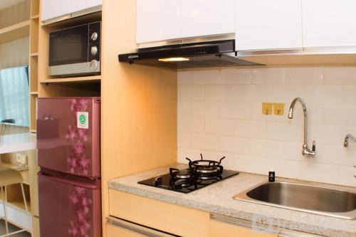 Cozy and Warm Studio at Grand Kamala Lagoon Apartment By Travelio