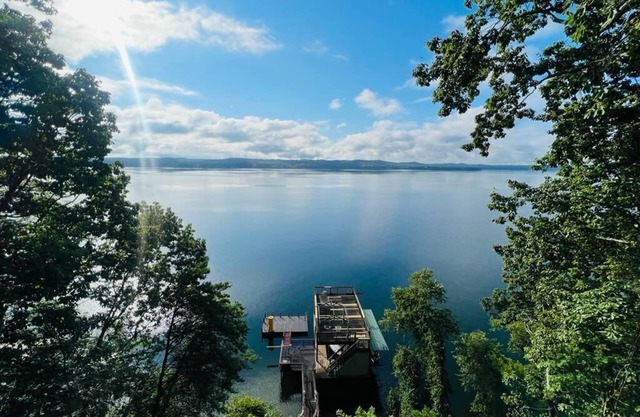Cozy Lake House! Spacious boat dock with swimming deck and awesome views.