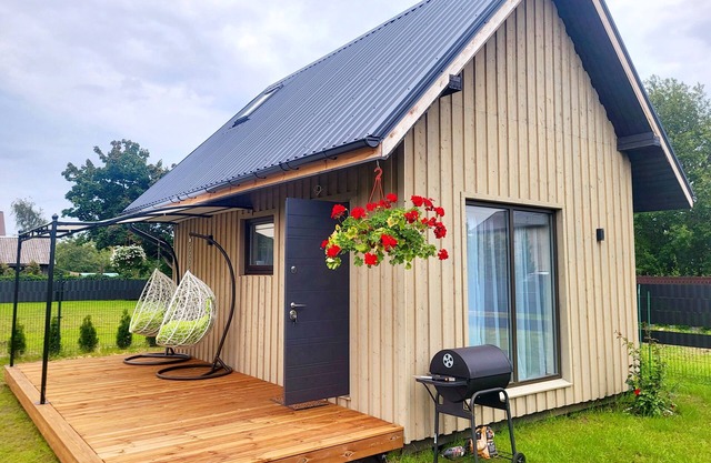 Cozy lodge in charming Sigulda with FREE-WiFi, private tarritory and grill