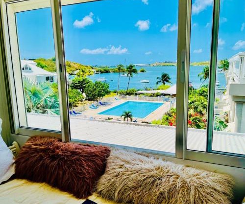 Cozy Waterfront Two-Level Condo with 2 Bathrooms ,Pool, AC