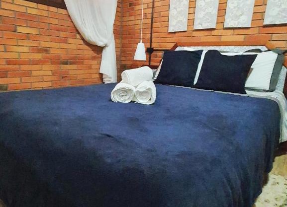 Dúplex 400m do Lago com lareira e garagem