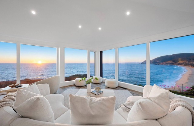 Distinguished Oceanfront Point Estate with Iconic Beach + Mountain Vistas