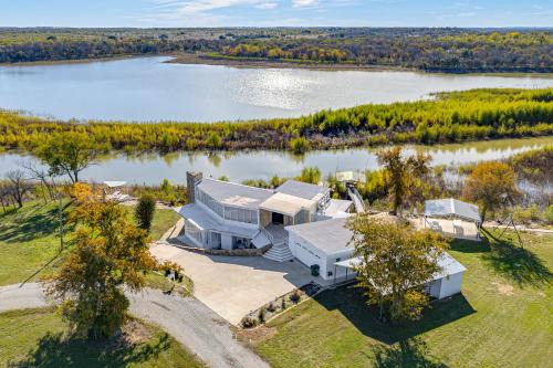 Dock and Fire Pit Riverfront Runaway Bay Retreat