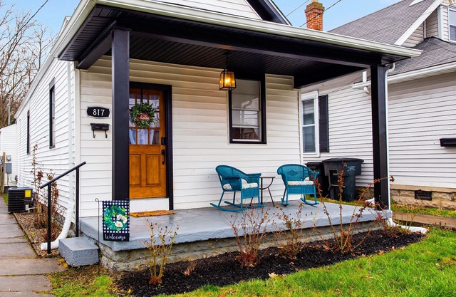 Dog-friendly 1920s charmer with bohemian finishes, firepit, central air, and W/D