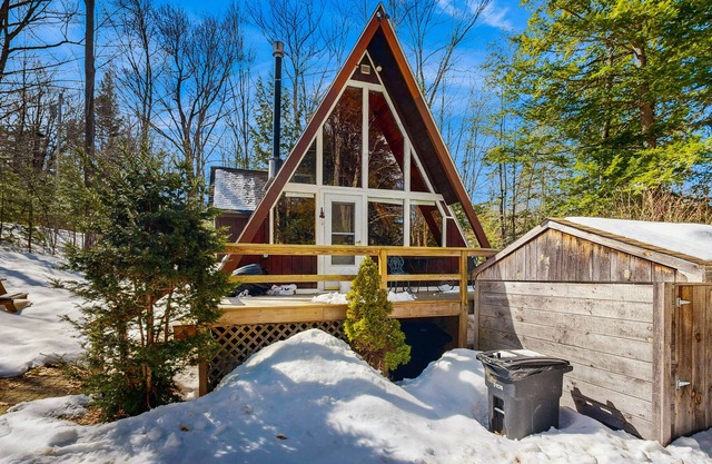 Dog-friendly A-frame with firepit, fireplace, AC, & kayaks - walk to the beach